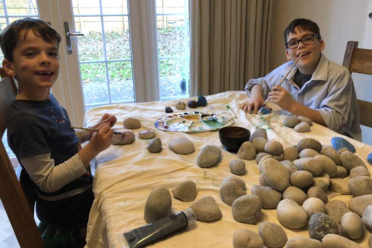 Rockfun founder Oliver and his brother painting rocks in the beginning.